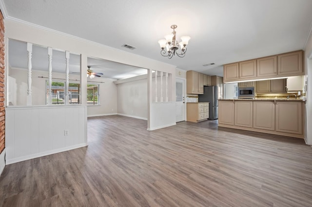 11705 Oak Trl, Austin, TX 78753 - unfurnished living room featuring a chandelier, light wood-style flooring, and ceiling fan