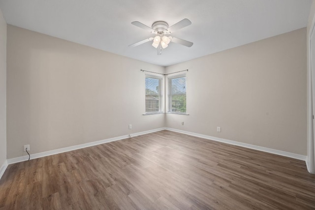 11705 Oak Trl, Austin, TX 78753 - spare room with a ceiling fan and wood finished floors