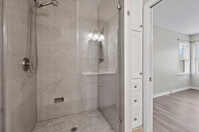 11705 Oak Trl, Austin, TX 78753 - full bathroom with a stall shower and wood finished floors