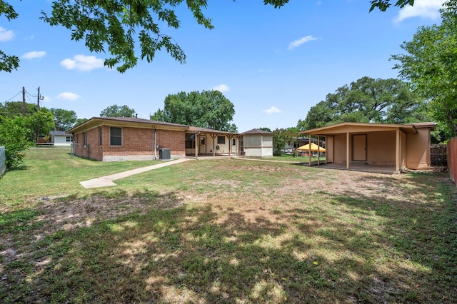 11705 Oak Trl, Austin, TX 78753 - back of house featuring brick siding
