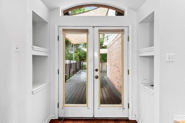 13121 Armaga Springs Rd, Austin, TX 78727 - doorway with french doors and vaulted ceiling