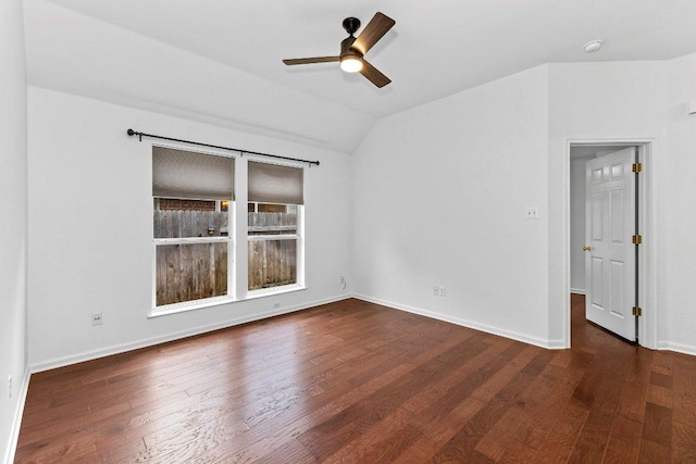 13121 Armaga Springs Rd, Austin, TX 78727 - empty room with vaulted ceiling, a ceiling fan, wood finished floors, and a smoke detector