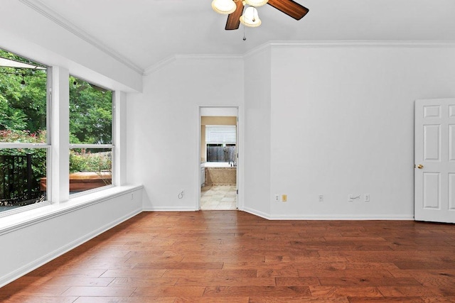 13121 Armaga Springs Rd, Austin, TX 78727 - unfurnished room featuring crown molding, ceiling fan, and hardwood / wood-style flooring