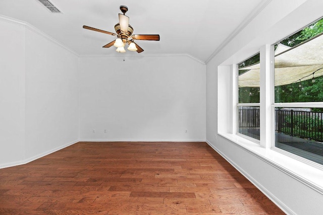 13121 Armaga Springs Rd, Austin, TX 78727 - spare room with crown molding, lofted ceiling, wood finished floors, and ceiling fan