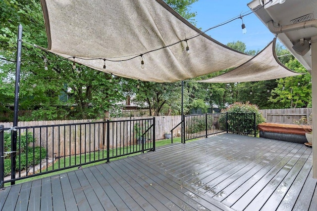13121 Armaga Springs Rd, Austin, TX 78727 - wooden terrace with a fenced backyard