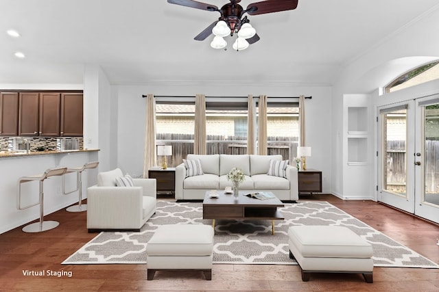 13121 Armaga Springs Rd, Austin, TX 78727 - living area featuring ceiling fan, crown molding, and wood finished floors