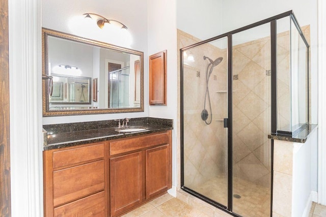 2713 Windy Vane Dr, Pflugerville, TX 78660 - full bathroom with vanity, a stall shower, and tile patterned flooring