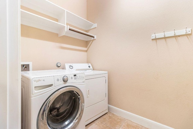 2713 Windy Vane Dr, Pflugerville, TX 78660 - laundry room featuring separate washer and dryer and light tile patterned flooring