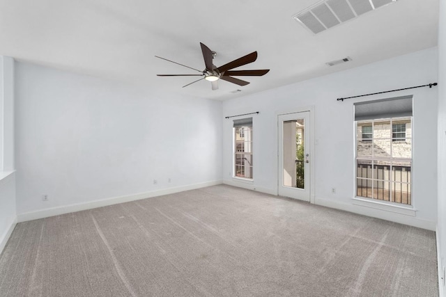 6715 Windrift Way Unit 29, Austin, TX 78745 - spare room featuring ceiling fan and carpet floors