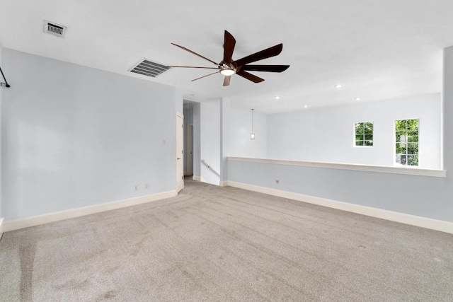 6715 Windrift Way Unit 29, Austin, TX 78745 - empty room with a ceiling fan, carpet floors, and recessed lighting