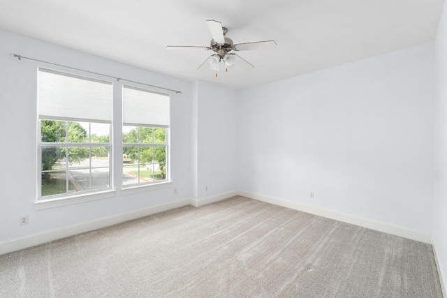 6715 Windrift Way Unit 29, Austin, TX 78745 - unfurnished room with light carpet and ceiling fan