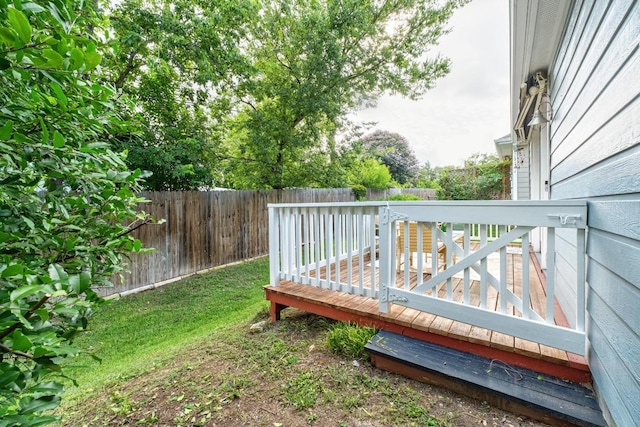 6715 Windrift Way Unit 29, Austin, TX 78745 - wooden terrace featuring a fenced backyard