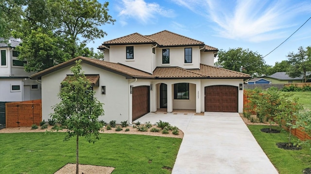 2007 Pasadena Dr, Austin, TX 78757 - mediterranean / spanish-style house with a tiled roof, stucco siding, concrete driveway, and an attached garage