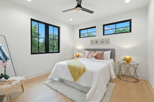 2007 Pasadena Dr, Austin, TX 78757 - bedroom featuring recessed lighting, wood finished floors, and a ceiling fan
