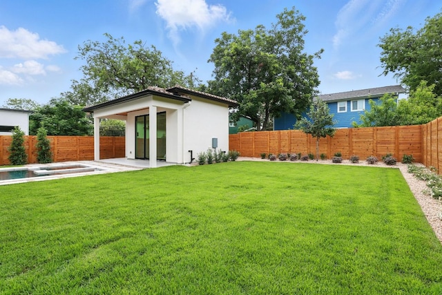2007 Pasadena Dr, Austin, TX 78757 - fenced backyard with a patio