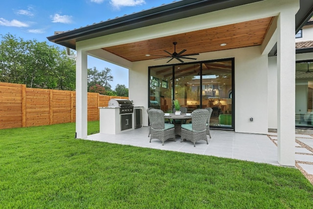 2007 Pasadena Dr, Austin, TX 78757 - view of patio with area for grilling, a ceiling fan, and outdoor dining area