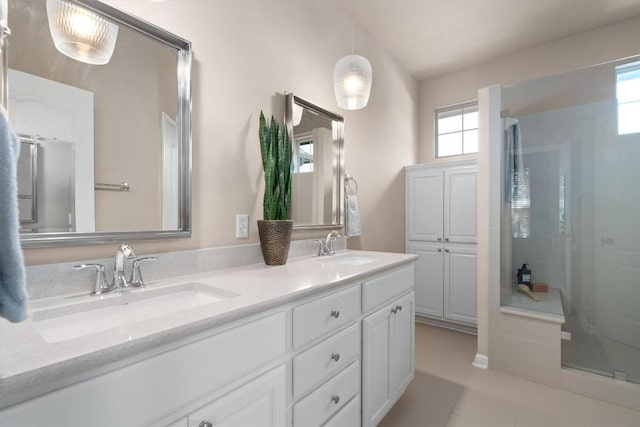 11000 Anderson Mill Rd Unit 52, Austin, TX 78750 - bathroom with double vanity, a stall shower, and tile patterned flooring