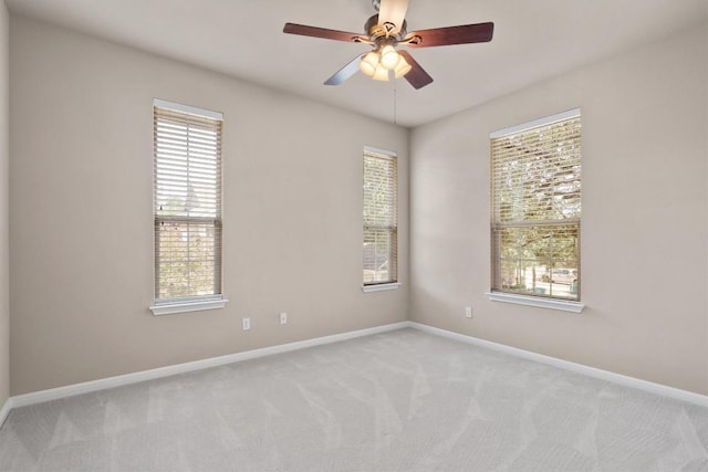 11000 Anderson Mill Rd Unit 52, Austin, TX 78750 - empty room with plenty of natural light, light carpet, and ceiling fan