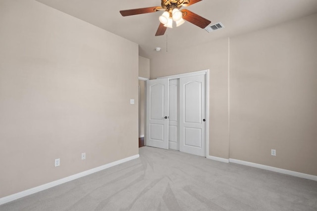 11000 Anderson Mill Rd Unit 52, Austin, TX 78750 - unfurnished bedroom with light carpet, a closet, and ceiling fan