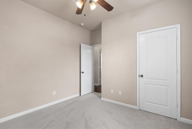 11000 Anderson Mill Rd Unit 52, Austin, TX 78750 - unfurnished bedroom with light carpet and a ceiling fan