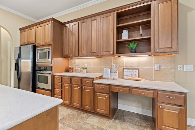 1343 River Forest Dr, Round Rock, TX 78665 - kitchen with appliances with stainless steel finishes, open shelves, crown molding, arched walkways, and light countertops