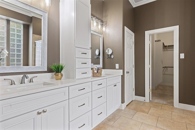 1343 River Forest Dr, Round Rock, TX 78665 - full bath with double vanity, a spacious closet, ornamental molding, and tile patterned flooring