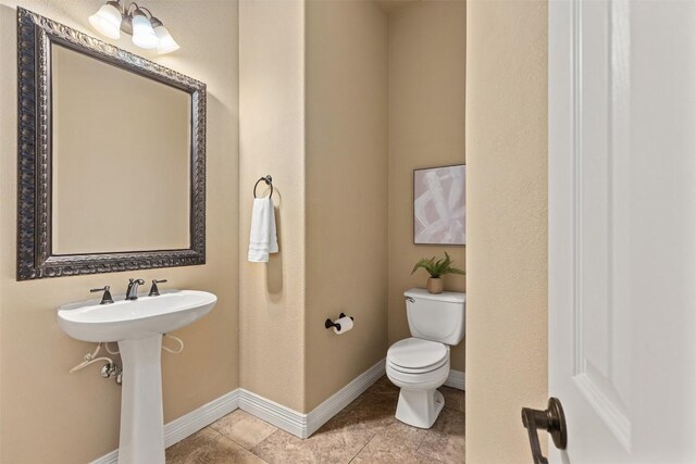 1343 River Forest Dr, Round Rock, TX 78665 - half bathroom featuring toilet and tile patterned floors