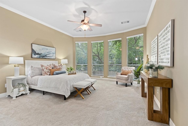 1343 River Forest Dr, Round Rock, TX 78665 - carpeted bedroom with crown molding, multiple windows, and a ceiling fan