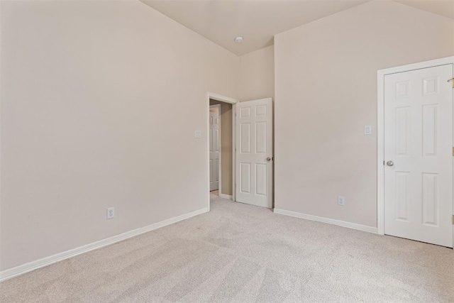 1343 River Forest Dr, Round Rock, TX 78665 - unfurnished bedroom with light colored carpet and vaulted ceiling