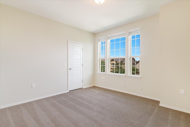 9516 Hunter Ln, Austin, TX 78748 - carpeted empty room featuring baseboards