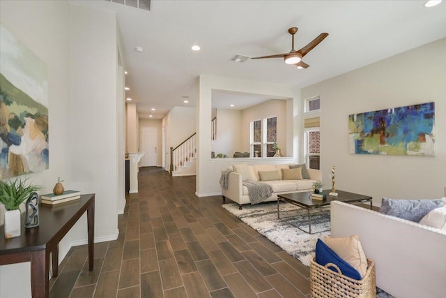 9516 Hunter Ln, Austin, TX 78748 - living room with ceiling fan, recessed lighting, stairs, and dark wood finished floors