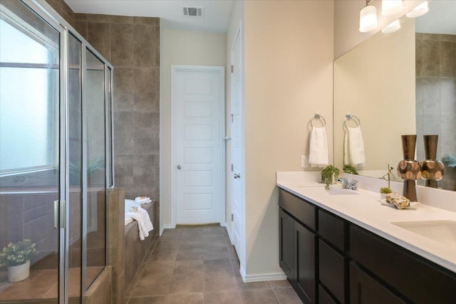 9516 Hunter Ln, Austin, TX 78748 - bathroom with plenty of natural light, double vanity, and a stall shower
