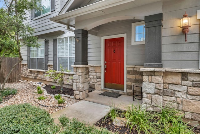 8518 Cahill Dr Unit 23, Austin, TX 78729 - view of exterior entry featuring stone siding