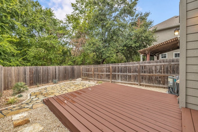 8518 Cahill Dr Unit 23, Austin, TX 78729 - wooden terrace with a fenced backyard and a patio