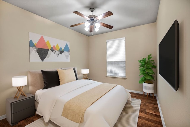 8518 Cahill Dr Unit 23, Austin, TX 78729 - bedroom with wood finished floors and ceiling fan
