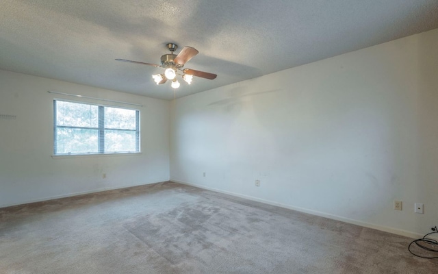 5605 China Berry Rd, Austin, TX 78744 - carpeted spare room featuring a ceiling fan and a textured ceiling