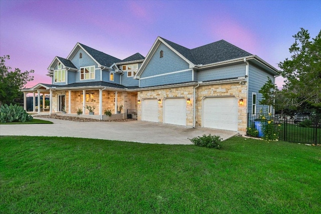 3009 Lawrence Dr, Austin, TX 78734 - view of front facade with a porch, driveway, and stone siding