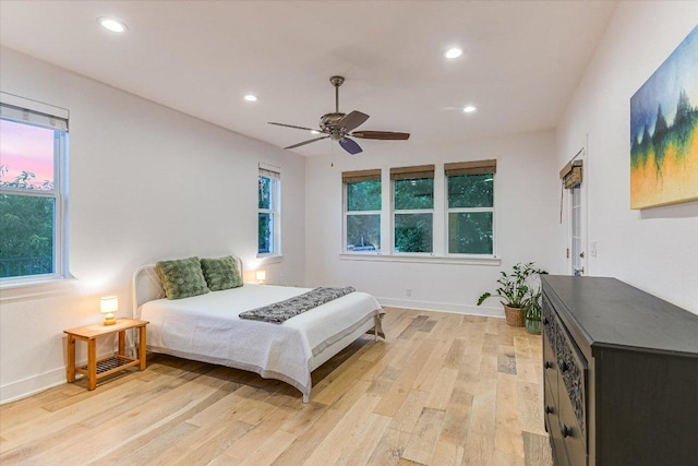 3009 Lawrence Dr, Austin, TX 78734 - bedroom featuring light wood-style floors, multiple windows, recessed lighting, and a ceiling fan
