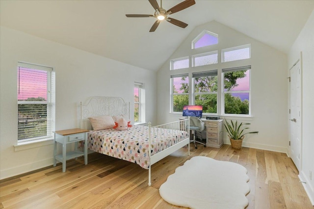 3009 Lawrence Dr, Austin, TX 78734 - bedroom featuring wood finished floors, high vaulted ceiling, and ceiling fan