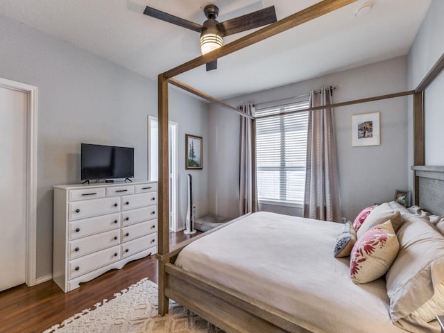 13320 Gilwell Dr, Del Valle, TX 78617 - bedroom with dark wood finished floors and ceiling fan