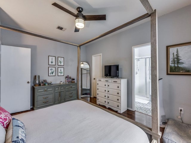 13320 Gilwell Dr, Del Valle, TX 78617 - bedroom featuring wood finished floors, ceiling fan, and ensuite bathroom