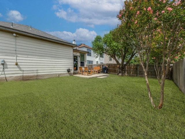13320 Gilwell Dr, Del Valle, TX 78617 - fenced backyard featuring a patio
