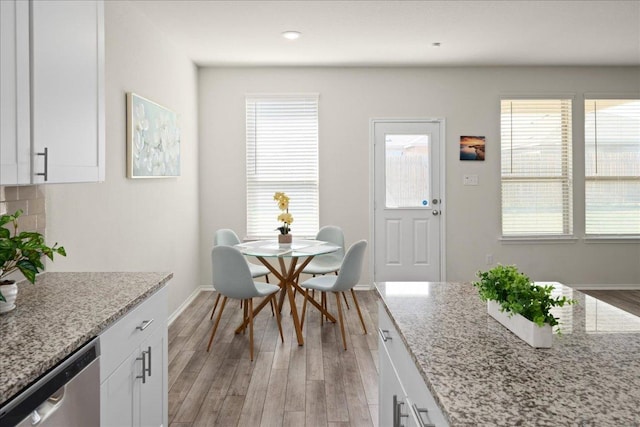 212 Gunther Way, Taylor, TX 76574 - dining space featuring light wood finished floors