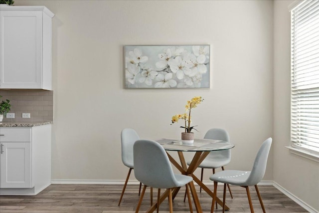 212 Gunther Way, Taylor, TX 76574 - dining area featuring wood finished floors and baseboards