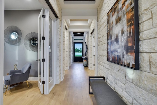 19617 Serenity Ln, Lago Vista, TX 78645 - hall featuring wood finished floors and a tray ceiling