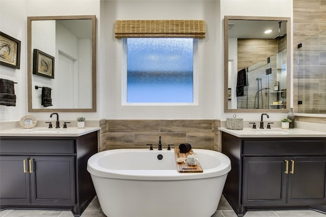 19617 Serenity Ln, Lago Vista, TX 78645 - bathroom with a stall shower, two vanities, and a soaking tub