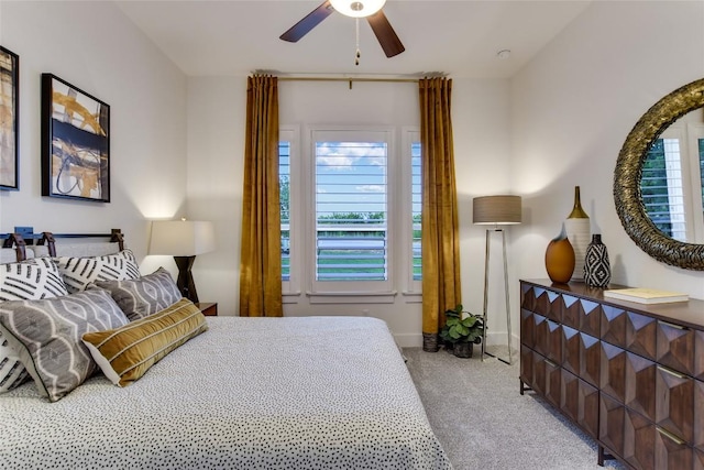 19617 Serenity Ln, Lago Vista, TX 78645 - carpeted bedroom with baseboards and ceiling fan