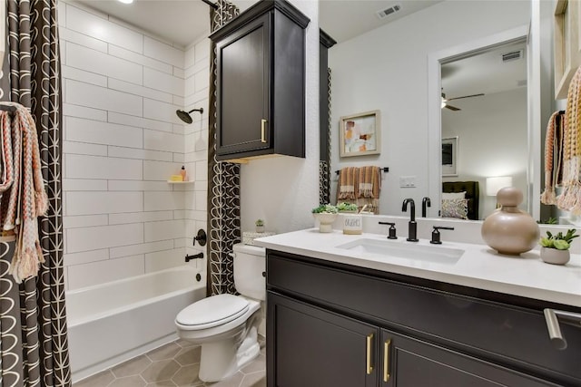 19617 Serenity Ln, Lago Vista, TX 78645 - bathroom featuring vanity, shower / bathtub combination with curtain, tile patterned flooring, and a ceiling fan