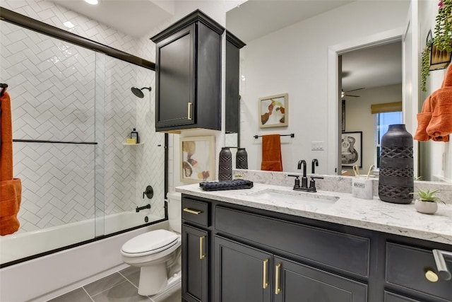 19617 Serenity Ln, Lago Vista, TX 78645 - full bath with vanity, combined bath / shower with glass door, tile patterned flooring, and a ceiling fan
