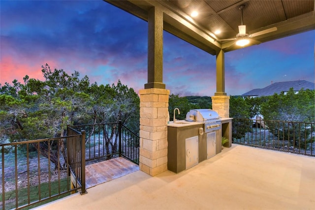 19617 Serenity Ln, Lago Vista, TX 78645 - patio terrace at dusk featuring area for grilling and a ceiling fan